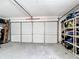 Spacious two car garage with an automatic door, ready for parking or storage at 2771 Ne 66Th St, Ocala, FL 34479
