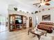 Inviting living room with vaulted ceiling, hardwood floors, ceiling fan, and decorative decor at 2771 Ne 66Th St, Ocala, FL 34479