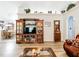 Inviting living room with hardwood floors, ceiling fan, and decorative decor, with a view of the dining room at 2771 Ne 66Th St, Ocala, FL 34479
