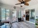 Charming sunroom with an outdoor patio, ready for relaxing or entertaining at 2771 Ne 66Th St, Ocala, FL 34479