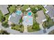 Aerial shot of a home showcasing a spacious backyard and proximity to nearby pools at 2835 Bongart Rd, Winter Park, FL 32792