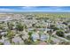 An aerial view showcasing a residential neighborhood with tree-lined streets and well-spaced homes at 2835 Bongart Rd, Winter Park, FL 32792