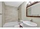 Stylish bathroom with updated fixtures, a soaking tub and a unique vessel sink at 2835 Bongart Rd, Winter Park, FL 32792