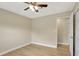 Bedroom features include hardwood floors, ceiling fan, and connecting door at 2835 Bongart Rd, Winter Park, FL 32792