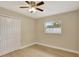 Bedroom with hardwood floors, a ceiling fan, and a closet at 2835 Bongart Rd, Winter Park, FL 32792