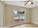 Bedroom featuring wood-look floors, ceiling fan, closet, and sliding glass door view of pool at 2835 Bongart Rd, Winter Park, FL 32792