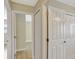 Hallway shows view to bedroom and closets at 2835 Bongart Rd, Winter Park, FL 32792