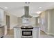 Modern kitchen with granite countertops, stainless steel appliances, and an island perfect for cooking at 2835 Bongart Rd, Winter Park, FL 32792