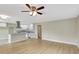 Well-lit kitchen featuring an island and modern stainless steel appliances at 2835 Bongart Rd, Winter Park, FL 32792