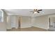 Living room with hardwood floors and view to hall and kitchen at 2835 Bongart Rd, Winter Park, FL 32792