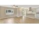 Open floor plan between living room and kitchen with modern finishes and lots of natural light at 2835 Bongart Rd, Winter Park, FL 32792