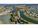 Aerial view of Bellalago showcases winding waterways, lush landscaping, and the community's layout at 2901 Agostino Ter, Kissimmee, FL 34746