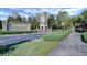 Bellalago's impressive entrance with a stone tower and manicured landscaping creates a welcoming atmosphere at 2901 Agostino Ter, Kissimmee, FL 34746