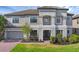 Charming two-story home boasting a covered entryway and a meticulously landscaped front yard at 2901 Agostino Ter, Kissimmee, FL 34746