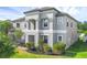 Beautiful two-story home featuring a neutral color palette and well-maintained landscaping at 2901 Agostino Ter, Kissimmee, FL 34746