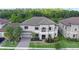 Stunning aerial view of a two-story home featuring manicured landscaping at 2901 Agostino Ter, Kissimmee, FL 34746
