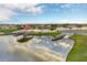 Picturesque lakeside docks offering a serene spot for boating and fishing amidst a beautiful community at 2901 Agostino Ter, Kissimmee, FL 34746
