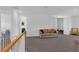 Spacious living area with neutral tones, comfortable seating, and ample natural light at 2901 Agostino Ter, Kissimmee, FL 34746