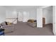 Spacious living area with neutral tones, comfortable seating, and ample natural light at 2901 Agostino Ter, Kissimmee, FL 34746