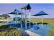 Colorful community playground with slides and shaded areas, perfect for outdoor activities and recreation at 2901 Agostino Ter, Kissimmee, FL 34746