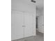 Spacious closet featuring bright white double doors providing ample storage at 2914 Scarlett Dr, St Cloud, FL 34772