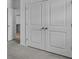 Spacious closet featuring bright white double doors providing ample storage at 2914 Scarlett Dr, St Cloud, FL 34772