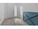 Entryway features wood look tile flooring and white walls at 2914 Scarlett Dr, St Cloud, FL 34772