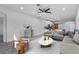 Spacious and stylish living room with hardwood floors, lots of natural light, and modern furniture at 2914 Scarlett Dr, St Cloud, FL 34772