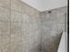 Close up of shower featuring neutral-colored tile at 2914 Scarlett Dr, St Cloud, FL 34772