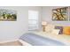 Bedroom with a view features window with natural light and yellow accents at 2928 Buccaneer Palm Rd, Kissimmee, FL 34747