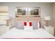 Spacious main bedroom showcasing a king-sized bed and decorative accents at 2928 Buccaneer Palm Rd, Kissimmee, FL 34747