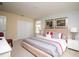 Bright main bedroom with a king-sized bed and tasteful decor at 2928 Buccaneer Palm Rd, Kissimmee, FL 34747