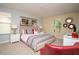 Comfortable main bedroom with a king-sized bed and tasteful decor at 2928 Buccaneer Palm Rd, Kissimmee, FL 34747