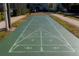 An outdoor shuffleboard court provides a fun and engaging recreational activity for residents at 2928 Buccaneer Palm Rd, Kissimmee, FL 34747