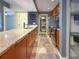 Well-equipped kitchen featuring granite countertops, stainless steel appliances, and slate floors at 3034 Parkway Blvd # 102, Kissimmee, FL 34747