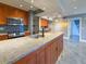 Kitchen with granite countertops, stainless steel appliances, and modern finishes at 3034 Parkway Blvd # 102, Kissimmee, FL 34747