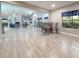 Spacious community lounge with ample seating and a stylish bar area at 3034 Parkway Blvd # 102, Kissimmee, FL 34747