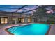 Refreshing pool with brick trim and steps, enclosed for year-round enjoyment, sunset views at 316 Cambridge Dr, Longwood, FL 32779