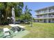Outdoor patio area with table and benches near the building at 320 Lakeview St # 220, Orlando, FL 32804