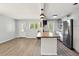 Open kitchen featuring stainless steel appliances, wood countertops, and an island, with lots of natural light at 320 Lakeview St # 220, Orlando, FL 32804
