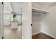 Spacious walk-in closet with shelf and bar, adjacent to the kitchen at 320 Lakeview St # 220, Orlando, FL 32804