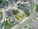 Aerial view highlighting property boundaries with the house situated on a well-maintained, grassy lot at 331 Erie Ct, Kissimmee, FL 34759
