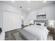 Relaxing main bedroom featuring a large bed, neutral tones, and an ensuite bathroom for ultimate comfort at 331 Erie Ct, Kissimmee, FL 34759