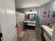 Nicely decorated bathroom featuring Mickey Mouse themed shower curtain and decor at 3391 S Kirkman Rd # 1236, Orlando, FL 32811