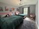 Well-lit bedroom featuring two beds, stylish lighting, and delightful Mickey Mouse themed artwork at 3391 S Kirkman Rd # 1236, Orlando, FL 32811