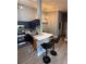 Open concept kitchen and living space with modern finishes and bright lighting at 3391 S Kirkman Rd # 1236, Orlando, FL 32811