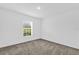 Neutral bedroom with carpet, natural light from the window at 3405 Yarian Dr, Haines City, FL 33844