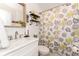 Bathroom featuring a vanity with sink, floral shower curtain, and decor at 3460 Fairway Ln, Orlando, FL 32804