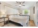 Bright main bedroom with hardwood floors, neutral decor, and large windows for natural light at 3460 Fairway Ln, Orlando, FL 32804