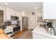 Updated kitchen featuring white cabinets, stainless steel appliances, and ample counter space at 3460 Fairway Ln, Orlando, FL 32804